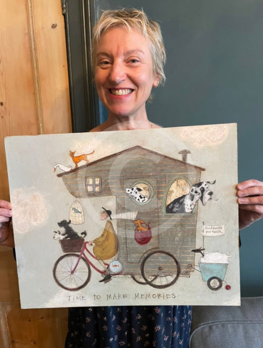 Artist Sam Toft with the original of Time to Make Memories