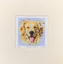 Golden Spirit by Rosie Smith — golden retriever with dark eyes and nose and a pink tongue, painted in loose golden and cream brushstrokes against a pale blue background, presented in a soft white mount