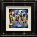 Framed colorful painting of a stylized city skyline at night with a boat on the water, shown in a glossy black frame with white matting.