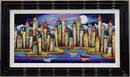 Colourful harbour painting with boats on a body of water, framed in black.