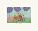 Illustration of a couple on a bicycle with a dog, under purple trees, with 'Joy to the World' text.