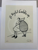 Art print featuring a black ink cartoon illustration of a person hugging a very round striped figure, with the handwritten phrase 'A Right Cuddle up' above them. The print is mounted on a white sheet of paper against a neutral background.