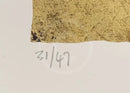 Close-up of a textured gold surface on an off-white background, with the handwritten numbers '31/47' visible below.