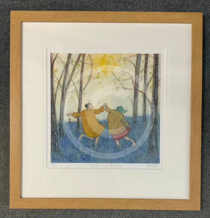 Ernest and Violet as they dance hand-in-hand through the bluebells, under a dappled sunny sky&nbsp;with Sam Toft's limited edition print, "Barefoot in the Bluebells“ Framed in oak metro
