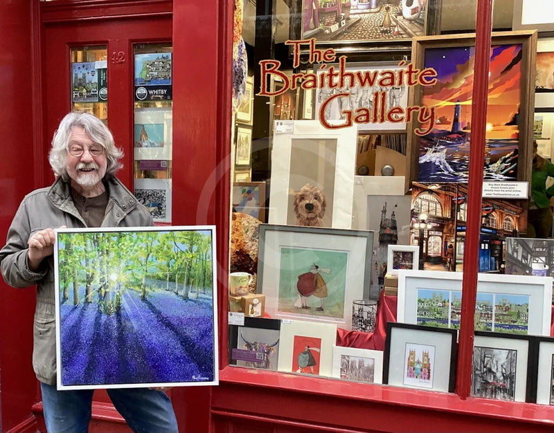 Artist Paul Freeman in front of Gallery.