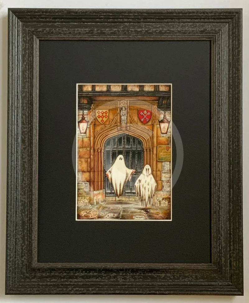 A Brother Betrayed Colour Edition Mounted Print. A ghost art print by Mark Braithwaite. Two ghosts floating in front of a stone door with a coat of arms above, in a gothic setting. The ghostly picture features St William’s College, York.
