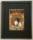 A Brother Betrayed Colour Edition Mounted Print. A ghost art print by Mark Braithwaite. Two ghosts floating in front of a stone door with a coat of arms above, in a gothic setting. The ghostly picture features St William’s College, York.