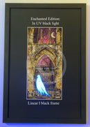 Framed artwork with a ghostly figure in front of a gothic arch, glowing under UV light.