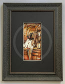 Beneath the Sheets; Treason and Plot - Colour Edition Mounted. Ghost with top hat and sword in a rustic setting with barrels and lanterns. Guy Fawkes about to blow up the barrels. Framed in Muse II. 
