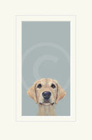 Framed artwork of a dog's face on a light blue background
