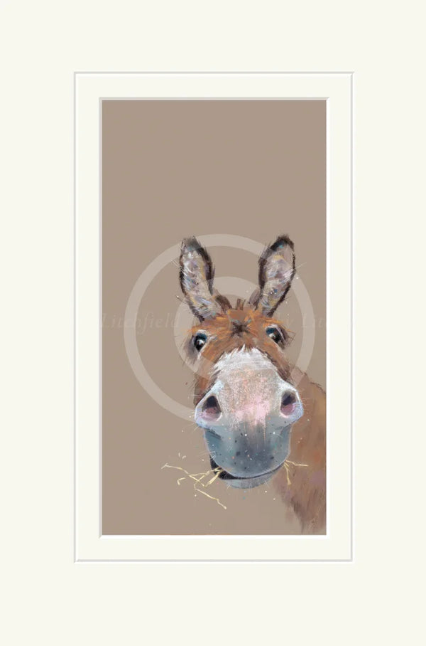 Framed artwork of a donkey's face on a beige background