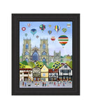 York Balloon Fiesta large contemporary embellished art print by Linda Mellin. This colourful cityscape shows hot air balloons over local landmarks including York Minster. Black frame.