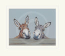 Two donkeys peeking over a wooden surface with a light blue background