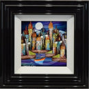 Framed artwork of a colorful cityscape with a boat on water