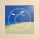 artwork of a blue sky with two clouds over a white sand beach.