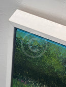 Framed in a White Wooden Tray frame with shadow gap, featuring painted wraparound effect on edge of board, June Meadow.