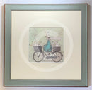 Meet the Mustards: All Aboard the Ducky Express by Sam Toft, mounted miniature print. A fun pictures of a man on a bicycle with two baskets carrying several white ducks and his black and white dog. Framed in Nordic Blue.