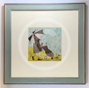 Meet the Mustards: Back to the Clubhouse by Sam Toft, mounted miniature print. A golf themed print of a person in a black coat holding up a black and white umbrella, carrying a dog in his golf club bag. A magpie leads the way.  Framed in Nordic Blue.