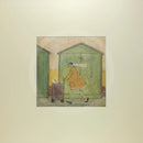 Meet the Mustards: Driving Miss Doris by Sam Toft, mounted miniature print. A fun picture of a man taking his dog Dorris for a walk in her doggy pram past a row of green beach huts. 