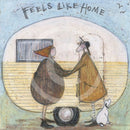Meet the Mustards: Feels Like Home by Sam Toft, mounted miniature print. A nostalgic picture of an elderly couple holding hands outside their vintage caravan with a little black and white dog.
