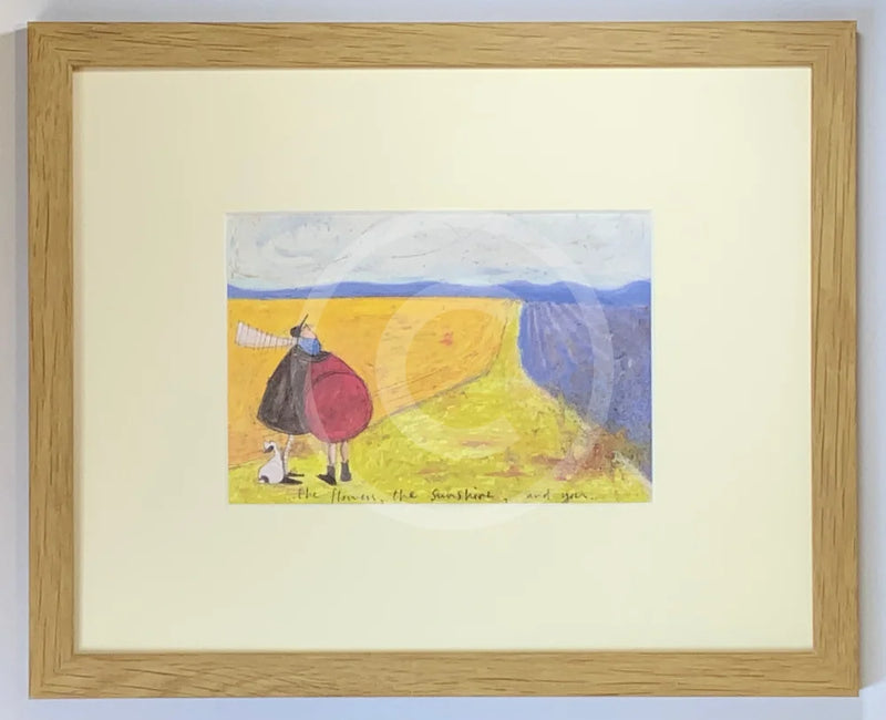 Meet the Mustards: The Flowers, The Sunshine and You by Sam Toft, mounted miniature Print. A couple gazing into a field full of flowers with their black and white dog. Framed in oak.