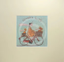Meet the Mustards: Ginger Nuts by Sam Toft, mounted miniature print. A fun print of a man riding his bicycle with a ginger coloured dog riding in the basket at the front and a striped ginger cat riding on the back. 