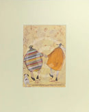 Meet the Mustards: Holding Hands Just Like We Used To by Sam Toft, mounted miniature. A couple holding hands shown from the back walking a black and white dog. 