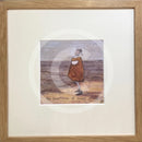 Meet the Mustards: The Importance of Small Things by Sam Toft, mounted miniature print. A thoughtful picture of a man called Mr Mustard stood on the beach looking out sea whilst holding on to his black and white dog Doris. Framed in oak.