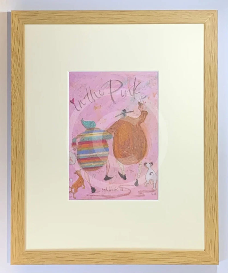 Meet the Mustards: In The Pink by Sam Toft, mounted miniature. A couple skipping arm in arm holding an ice cream followed by a dog and a cat. Framed in oak.
