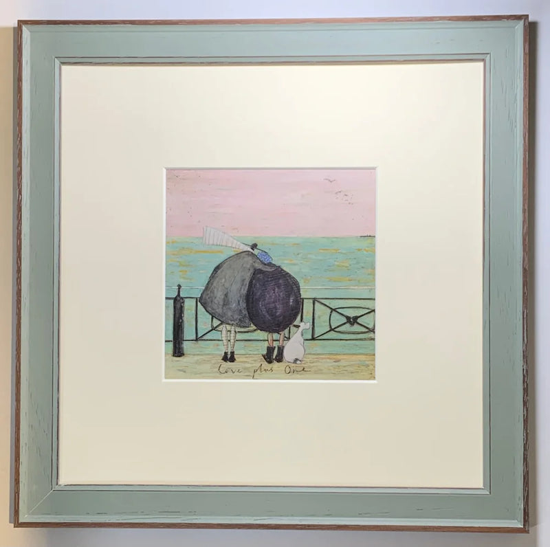 Meet the Mustards: Love Plus One by Sam Toft, mounted miniature print. A nostalgic picture of a couple having a cuddle on the promenade, looking out to sea with their black and white dog at their feet. Framed in Nordic blue. 