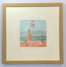Meet the Mustards: Rebel Rebel by Sam Toft, mounted miniature print. A fun picture of a man walking his dog on the promenade without a lead ignoring the sign. Framed in Oak.