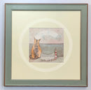 Meet the Mustards: Sea Cat by Sam Toft, mounted miniature print. A ginger cat sitting looking out to sea next to a miniature light house. Framed in Nordic Blue. 