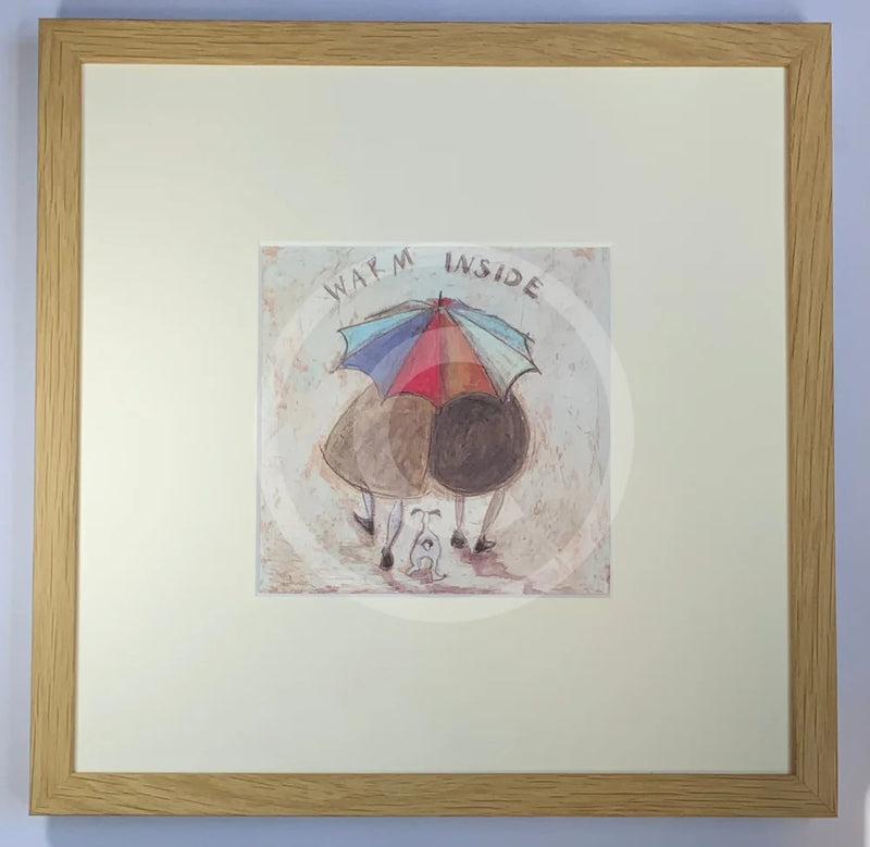 Meet the Mustards: Warm Inside by Sam Toft, mounted miniature print. A nostalgic picture of a couple, Mr Mustard and his wife Violet, viewed from the back walking under a brightly coloured umbrella with their black and white dog Doris following behind. Framed in oak.