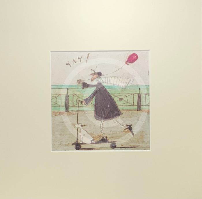 Meet the Mustards: Yay! by Sam Toft, mounted miniature print. A fun picture of a man, Mr Mustard holding a red balloon, rebelliously riding his scooter along the promenade, with his black and white dog Doris on board.  