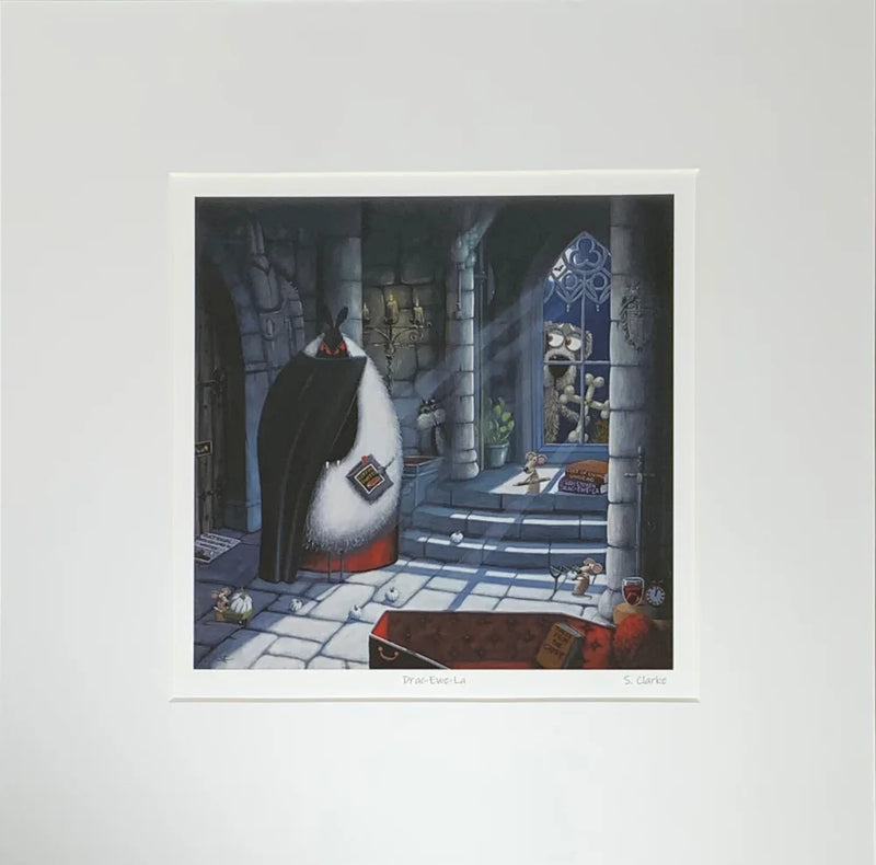 Mounted Miniature Print, Drac-Ewe-La, by Simon Clarke. A fun picture of a sheep playing Count Dracula in his castle. A dog is outside the window with two bones made into a cross. 