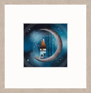 A framed art print featuring a whimsical illustration of a small house with an orange roof perched on a crescent moon against a starry blue night sky, set within a wide white mat and a light wood frame.