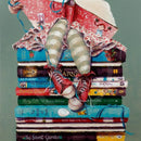 Pretty in Pink by Amanda Stratford Book Cover Art Limited Edition Print.  A girl sits atop a pile of iconic classic childhood books. 