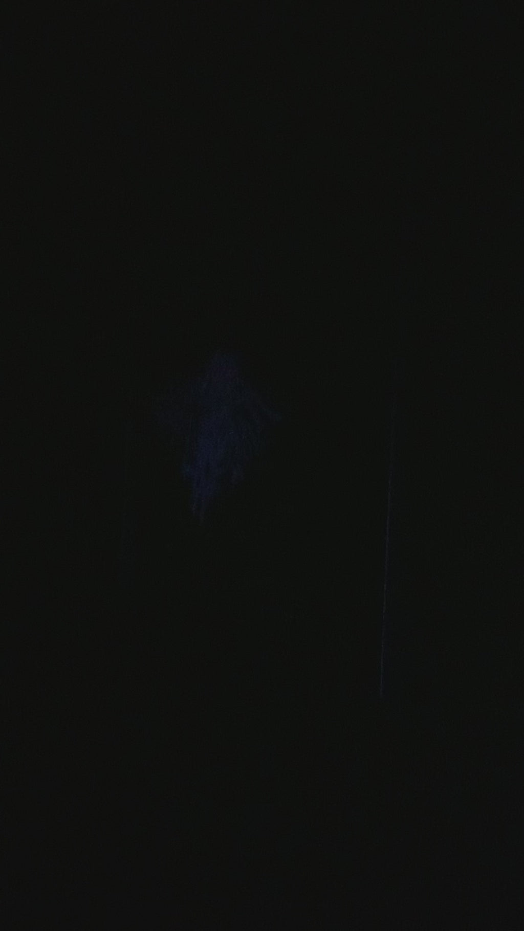 Watch the ghostly artwork glow under black light