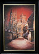 Framed artwork of York Minster at night with a snowy street.