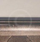 Small white mark on the bottom section of the frame