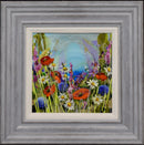Framed artwork of a colorful floral scene with a gray frame.
