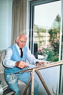Photo of Sam painting in his Studio 
