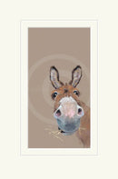 Framed artwork of a donkey's face on a beige background