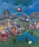 Colorful village scene with hot air balloons and mountains in the background