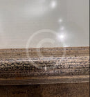 Small white mark on the bottom of the frame