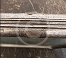 Damage to the back of the top section of the frame