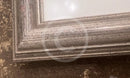 A small dent on the right hand corner of the frame