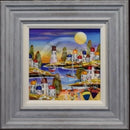 Framed artwork of a coastal scene with houses, boats, and a windmill.