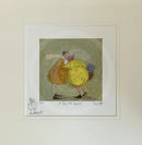 Art print featuring a whimsical illustration of two characters embracing, with a wide white mat border and artist signatures at the bottom.