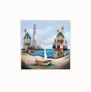 The Blue Lagoon by Gary Walton — two clusters of wonky coastal cottages with teal window frames either side of a sheltered lagoon, red and white lighthouse on the headland, sailboat on the vivid blue water and wooden rowing boat beached in the sandy foreground - mounted option